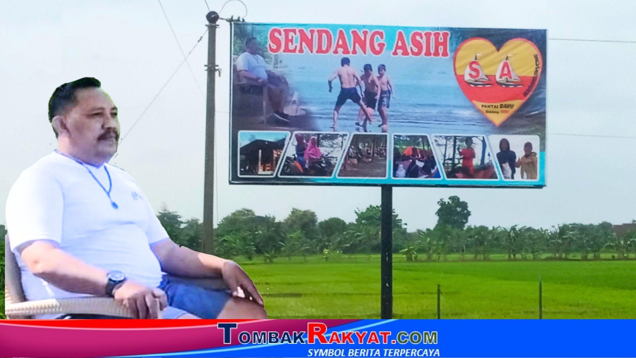 H. M.Kardiyantomo, S.E., dan baliho Sendang Asih dengan latar belakang hamparan sawah yang menghijau