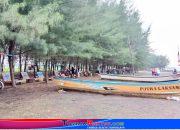 Cirikhas Pantai Sendang Asih, rimbun pepohonan cemara, hamparan pasir pantai dan perahu tradisional yang siap membawa pengunjung melihat pantai dari pinggiran laut Jawa